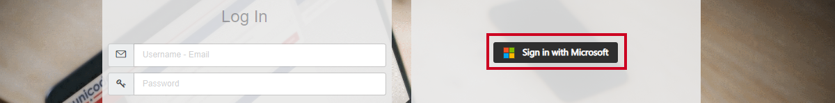 The black, rectangular Sign in with Microsoft button to the right of the Log In fields.